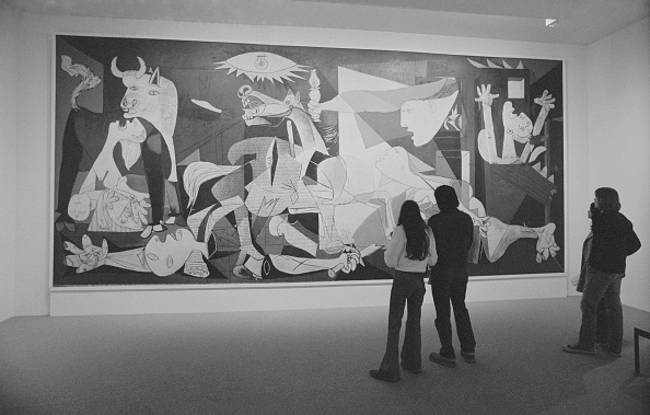 Visitors Viewing Guernica by Pablo Picasso